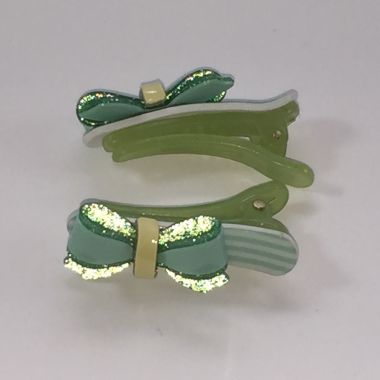 Crocodile clips with glittery bow