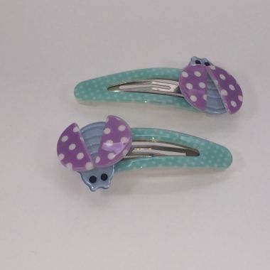 Patterned snap clip with ladybird