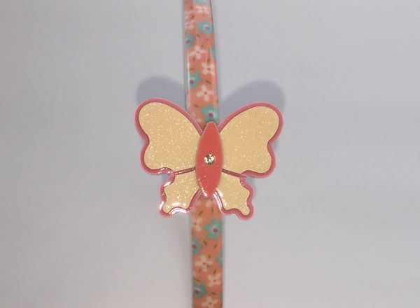 Patterned headband with butterfly shape