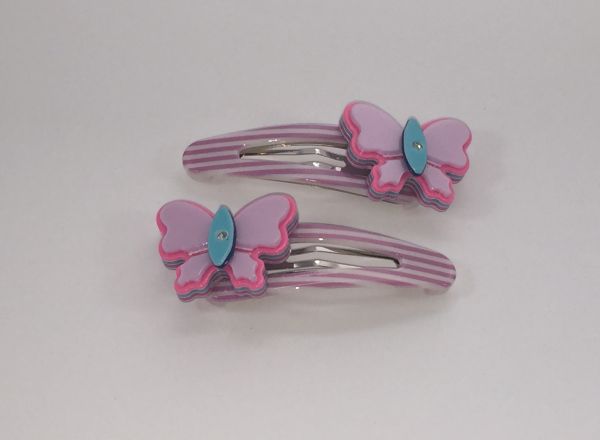 Patterned snap clip with butterfly