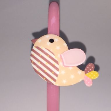 Head band with patterned bird shape