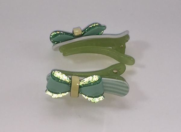 Crocodile clips with glittery bow