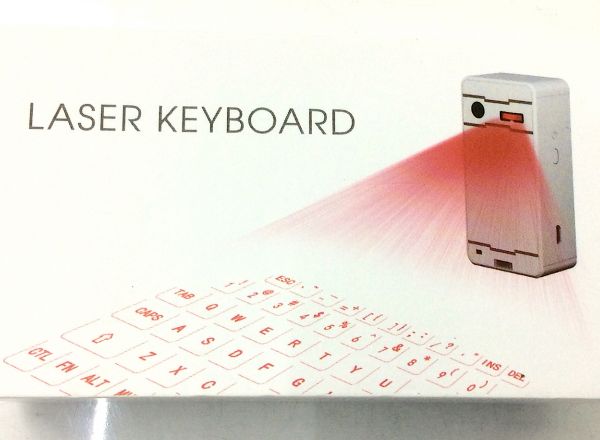 Laser keyboard with speaker