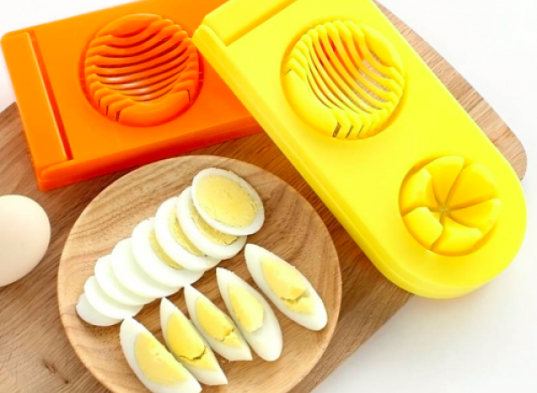 Multifunctional egg slicer