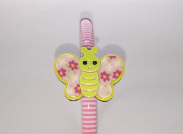 Patterned head band with butterfly shape