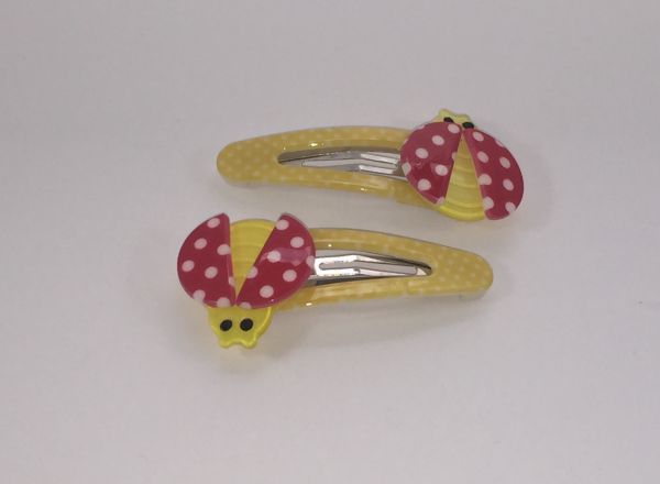 Patterned snap clip with ladybird