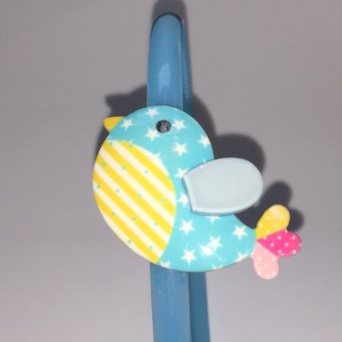 Head band with patterned bird shape